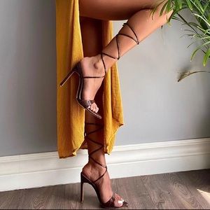 Brown Textured Wrap up Heels with pointed toe.
